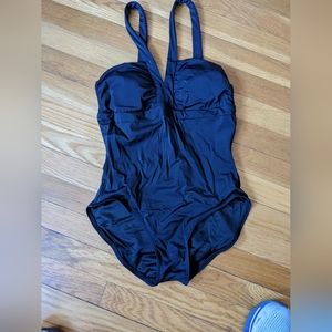 Gently worn Spanx one piece suit. Very flattering.
